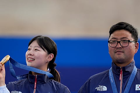 Archery mixed team medal ceremony: Gold Medallists Lim Sihyeon and Kim Woojin of South Korea